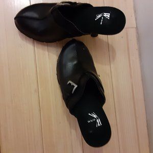 Black leather cloggs